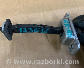 Обмежувач дверей KIA Rio JB