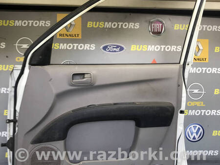 ФОТО Дверка передня права для Mitsubishi L200 (06-14) Коломия