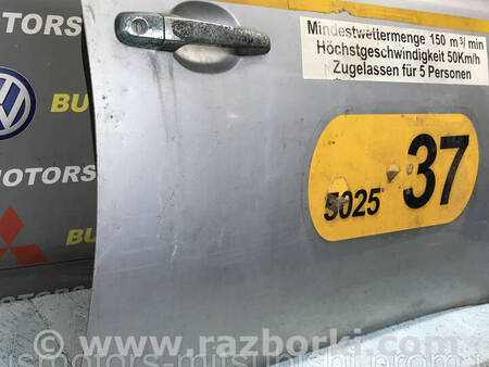 ФОТО Дверка передня права гола для Mitsubishi L200 (06-14) Коломия