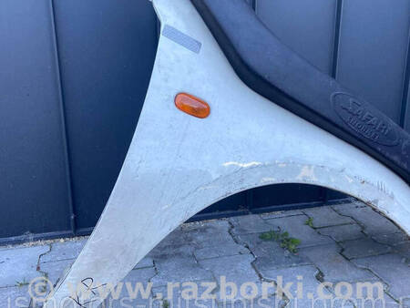 ФОТО Крило переднє праве для Mitsubishi L200 (06-14) Коломия