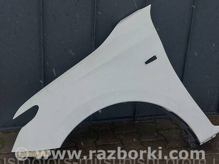 ФОТО Ліве крило для Mitsubishi L200 (06-14) Коломия