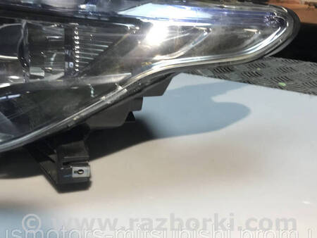 ФОТО Фара передня ліва ксенон для Mitsubishi L200 (06-14) Коломия