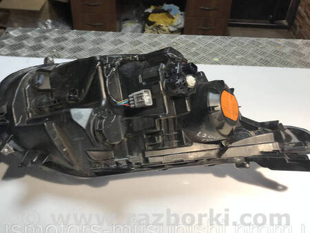 ФОТО Фара передня ліва ксенон для Mitsubishi L200 (06-14) Коломия