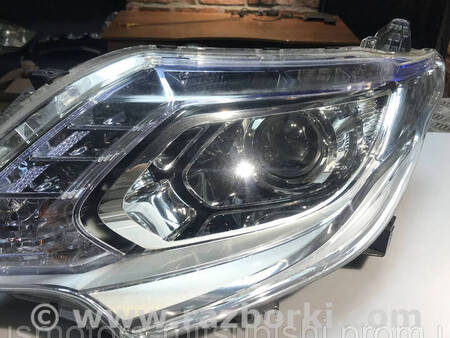 ФОТО Фара передня ліва ксенон для Mitsubishi L200 (06-14) Коломия