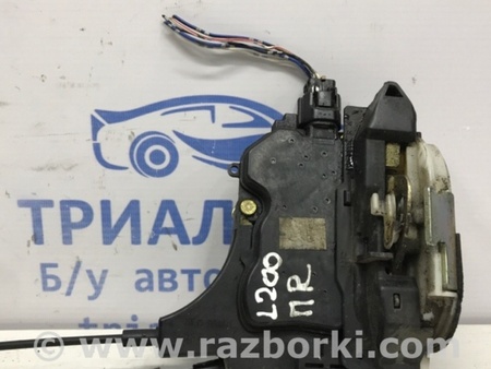 ФОТО Замок двери передний правый для Mitsubishi L200 (06-14) Киев