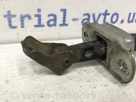 ФОТО Ограничитель двери задний левый для Mitsubishi L200 (06-14) Киев