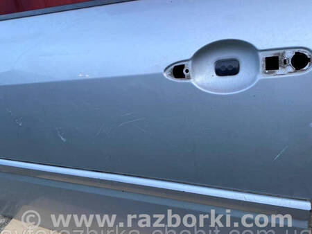 ФОТО Двері передні ліві для Renault Laguna III (07-15) Костопіль