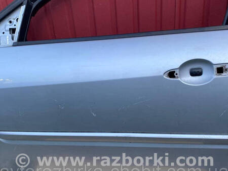 ФОТО Двері передні ліві для Renault Laguna III (07-15) Костопіль