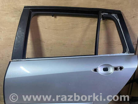 ФОТО Двері задні ліві для Renault Laguna III (07-15) Костопіль