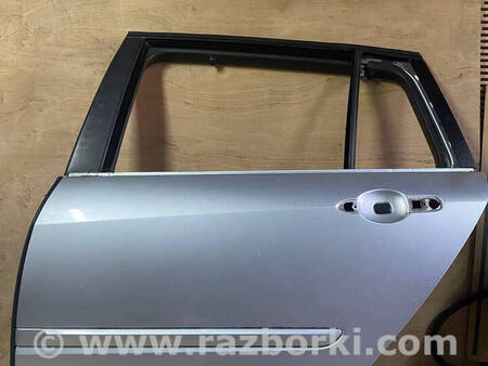 ФОТО Двері задні ліві для Renault Laguna III (07-15) Костопіль