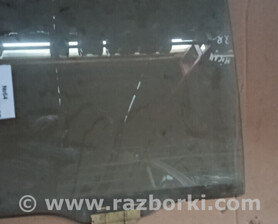 Скло дверне заднє праве Nissan Sunny