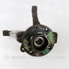 Кулак поворотный левый под ABS Nissan Micra K12 (02-10)