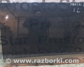 Стекло задней левой двери KIA Carnival 2 (2006-2014)