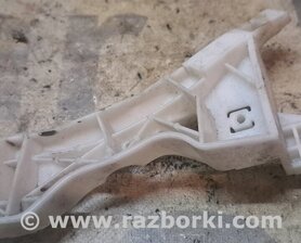 Кронштейн бампера переднего правый Mazda 3 I BK (03-09)