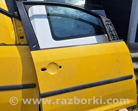 Двері передні Volkswagen Caddy III Typ 2K +рест (04-15)