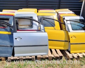 Двері задні ліві Volkswagen Caddy III Typ 2K +рест (04-15)