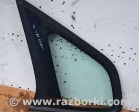 Стекло боковое глухое заднее левое KIA Carens 3 (06-13)