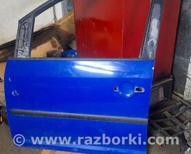 Двері передні Volkswagen Caddy III Typ 2K +рест (04-15)