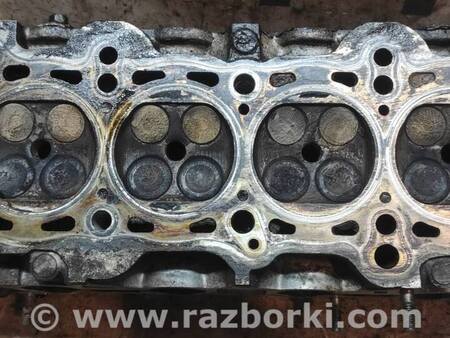 Головка блока для Mazda 323 BH, BA (1994-2000) Київ Z50210100A