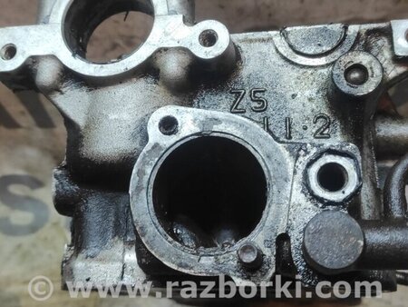 Головка блока для Mazda 323 BH, BA (1994-2000) Київ Z50210100A